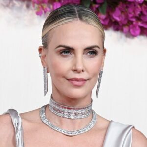 Charlize Theron Goes Backless in Silk Halter Top