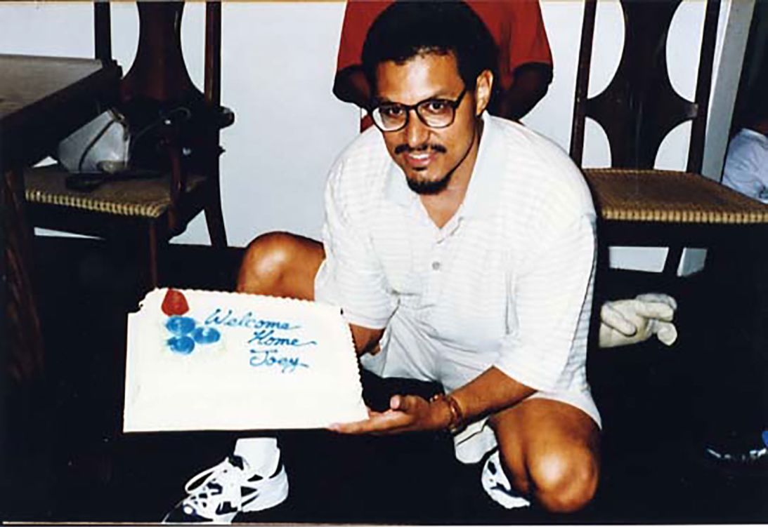 Joe Loya with the cake that greeted him upon his release from prison in July 1996.