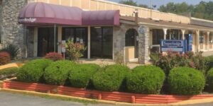 Armed Robbery at New Castle Motel Leaves Man Injured and Police Searching for Suspects