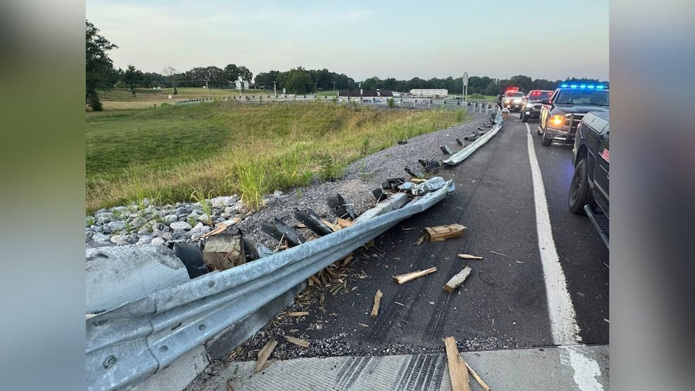 Semi-truck crashes over bridge