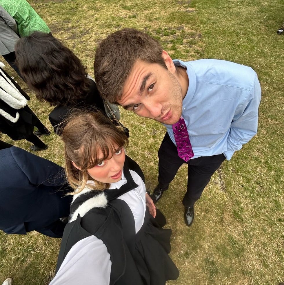 gabriel and paloma shemirani at her graduation day taking a selfie