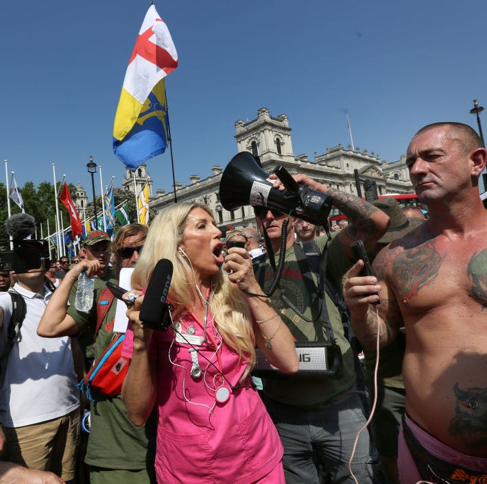 kate shemirani adresses protesters through a megaphone in parliament square as part of a freedom protest on july 19, 2021 in london, england. many believe the popular conspiracy theory that covid 19 was faked to provide an excuse for systematic regime change.